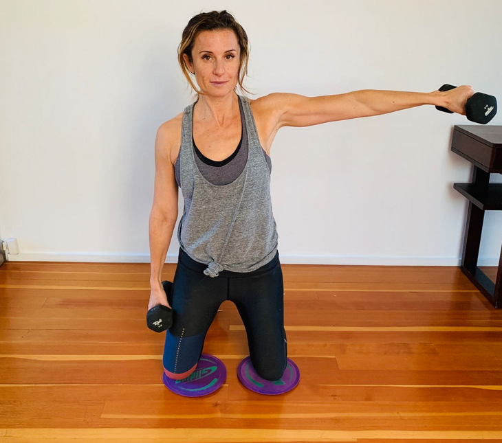 Screen Shot 2019-03-12 at 6.27.56 PM woman doing single arm lateral raise