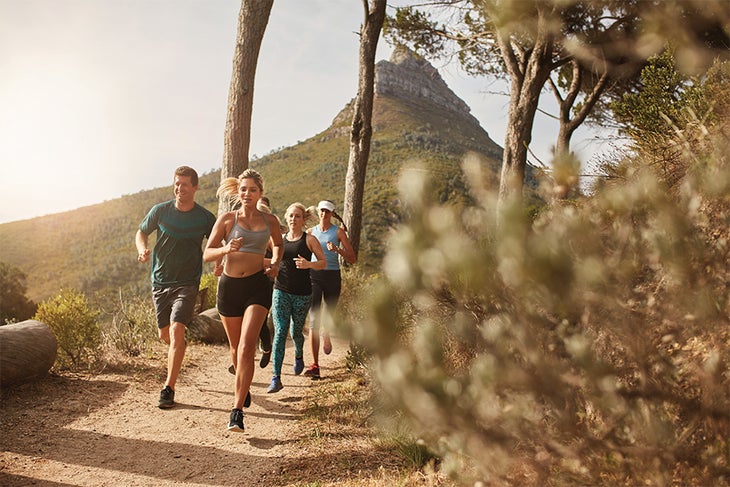 Marathon Group of fit adults running marathon