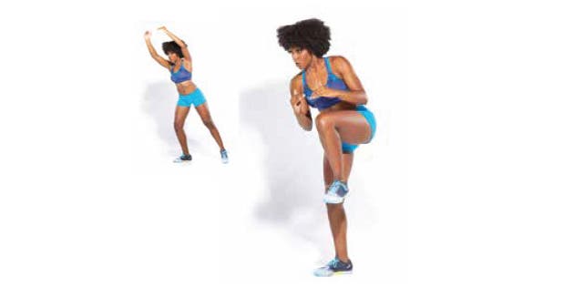 Woman boxing in reaching knee exercise