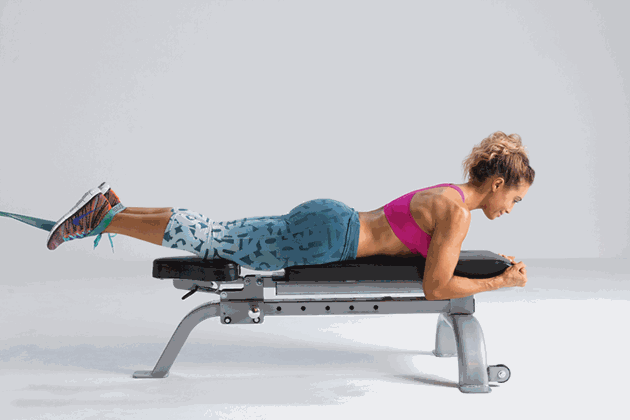 Resisitance-Band-Hamstring-Curl Total body hourglass with resistance band hamstring workout for women