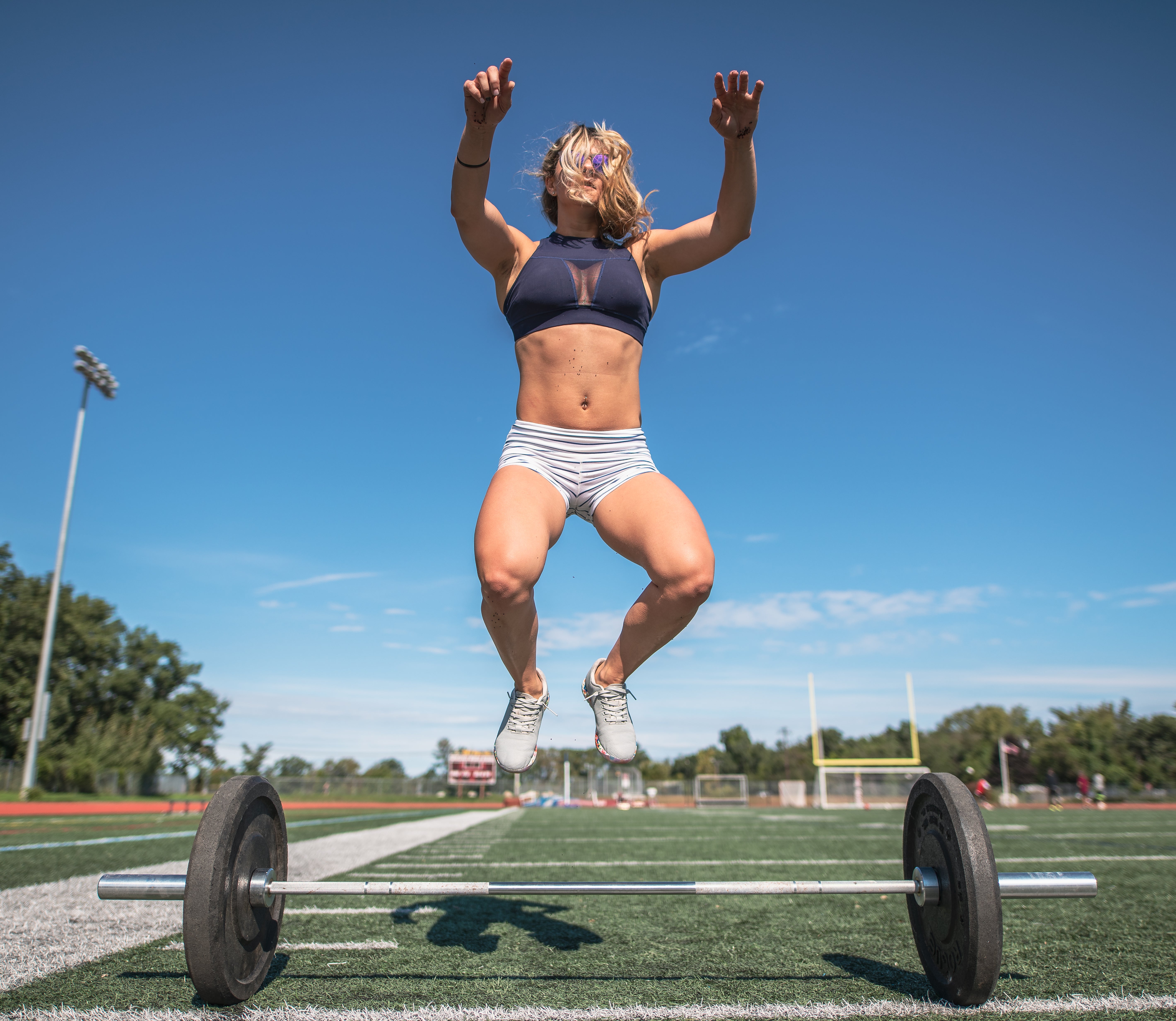 fit athlete outdoors doing burpee