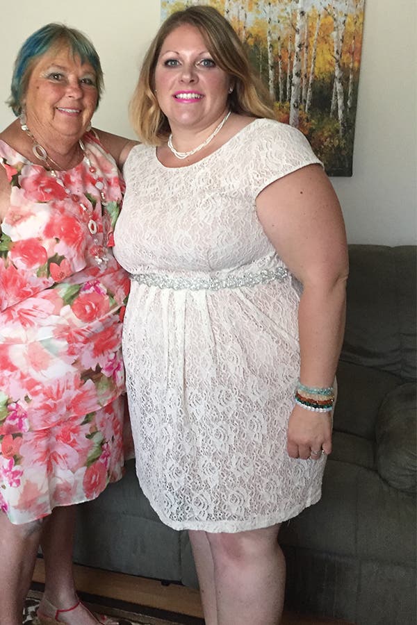 Before Julie Kelly before her weight-loss transformation, wearing a white dress