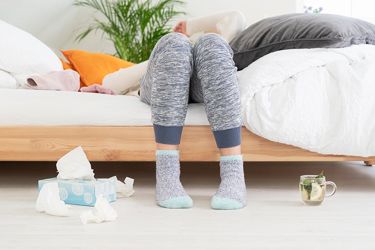 Sick Woman sick in bed