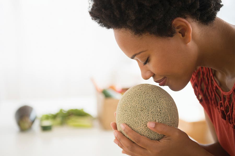 Woman with fresh fruit