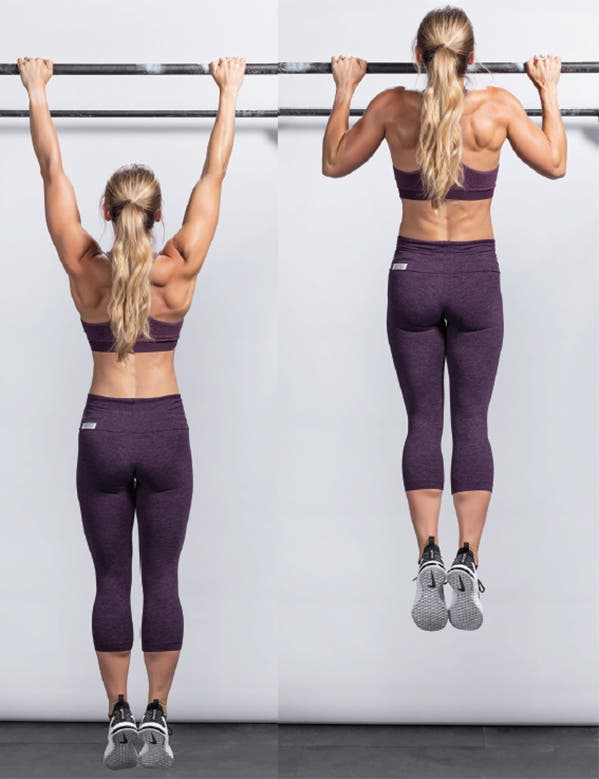 Woman doing a pull-up - vertical pull - functional training