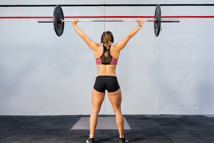 Stress and Training Crossover Woman weightlifting