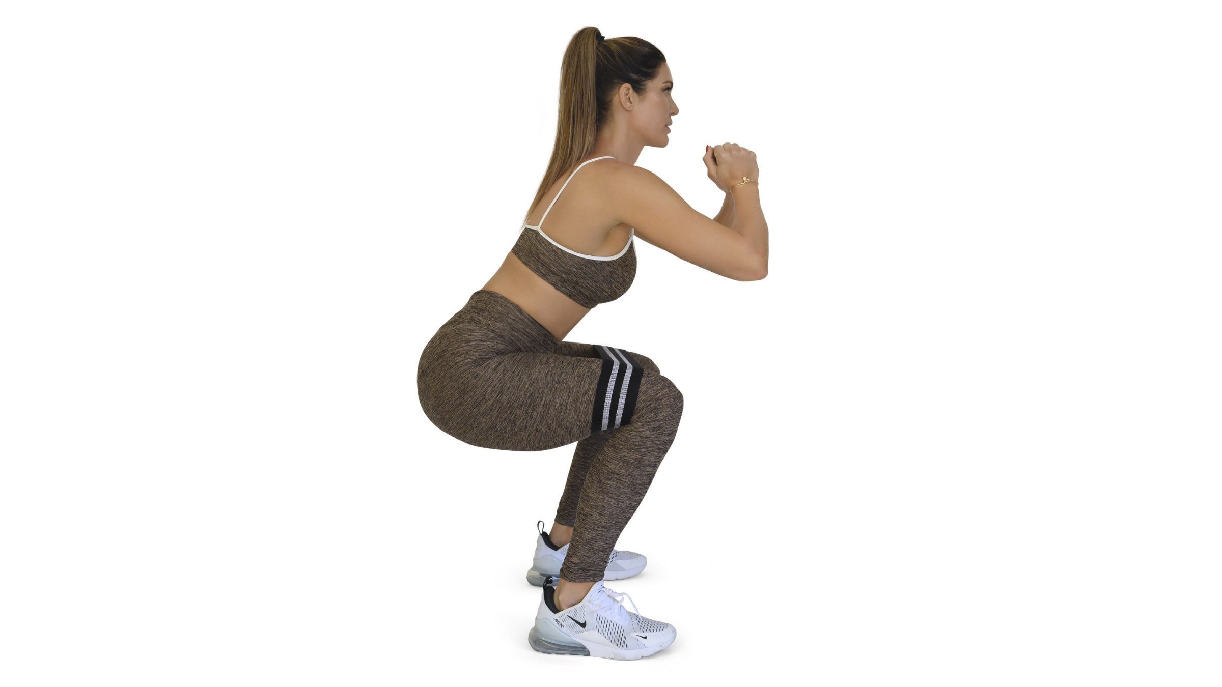 Woman demonstrating a squat hold