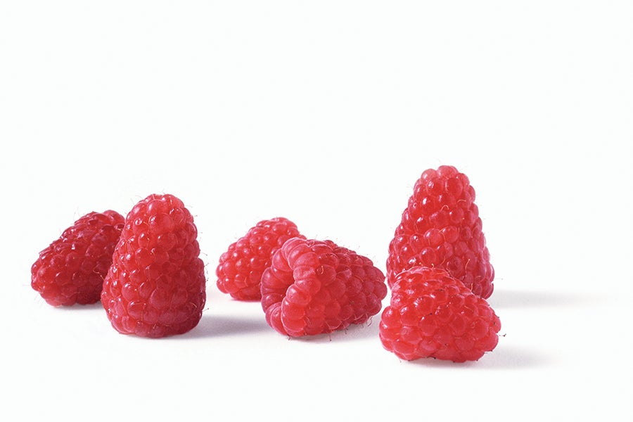 Raspberries on white background