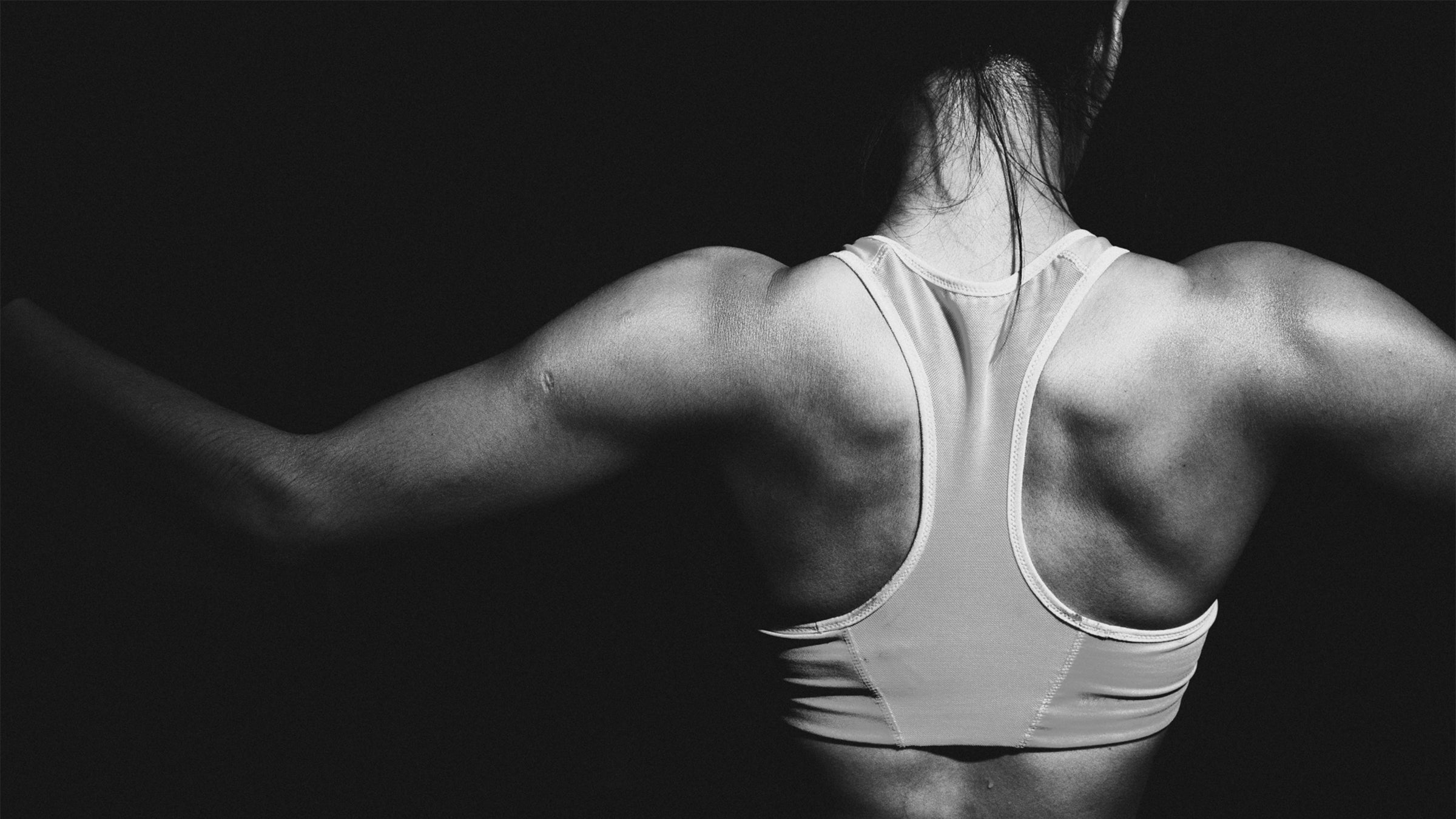 Woman's back flexing
